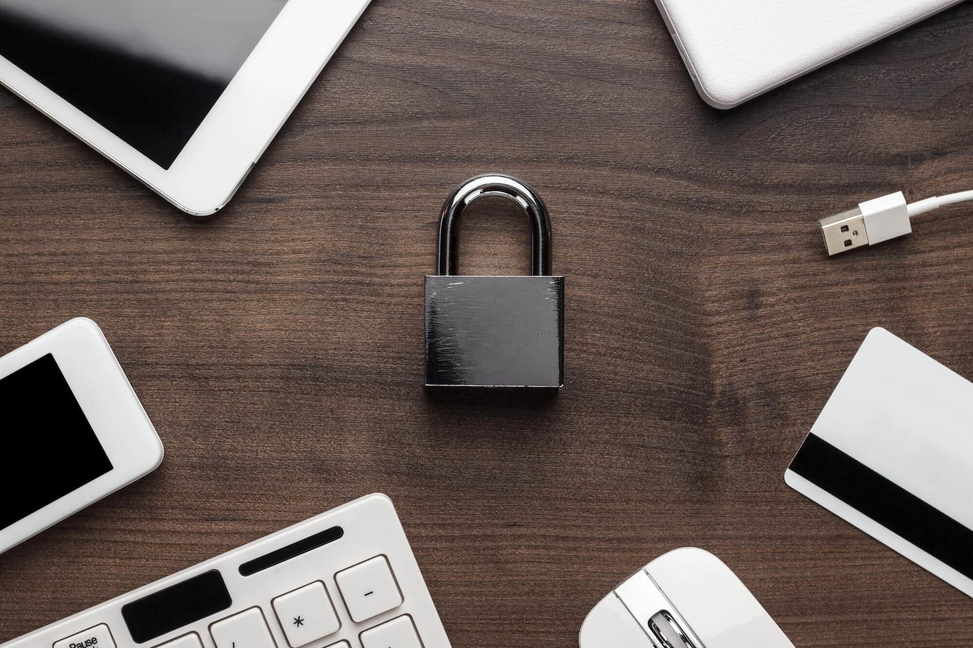 padlock and different gadgets on the wooden - GDPR / RGPD padlock and different gadgets on the wooden PCCFMTE 1